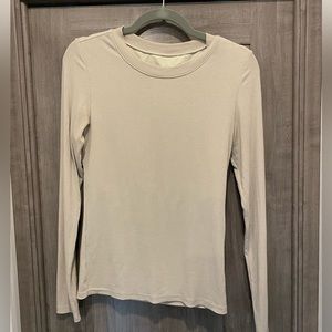 Tan long sleeved crew neck shirt with built in bra